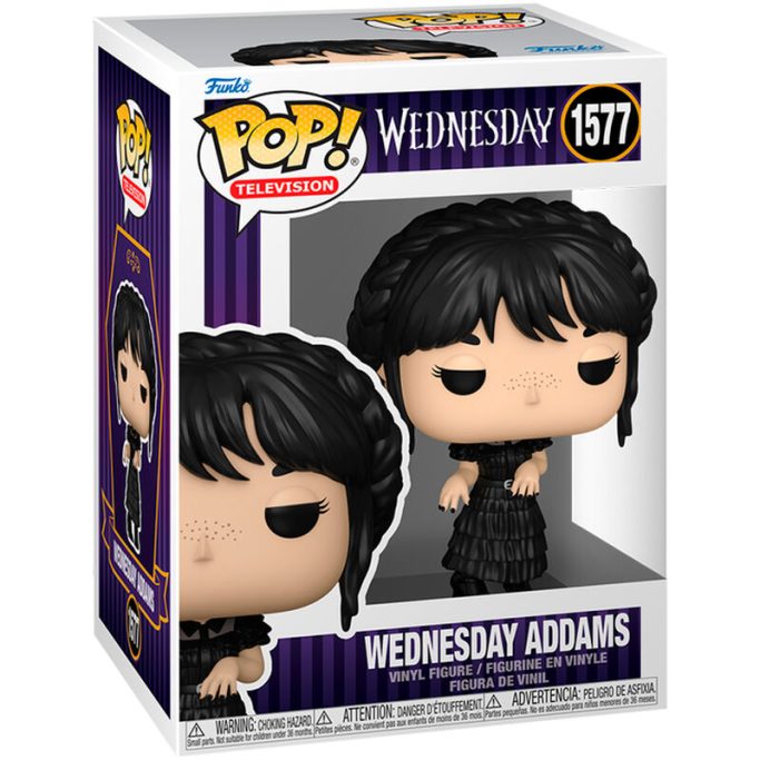 Figurita de Wednesday Addams en caja, con vestido negro y trenzas.
